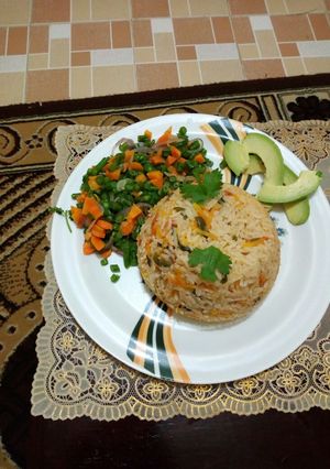 A picture of Fried rice with mixed vegetable.