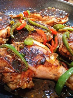 A picture of Pan-roasted chicken with peppers.