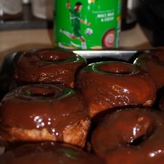 A picture of Milo Doughnuts with Silky Chocolate Ganache.