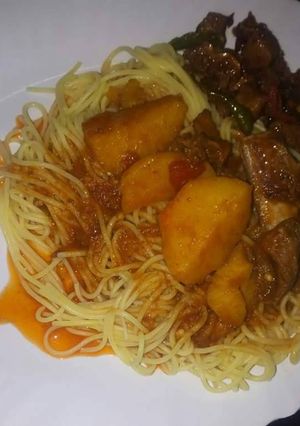 A picture of Spaghetti with wet fried beef.