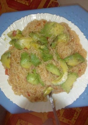 A picture of Fried spaghetti with avocado.