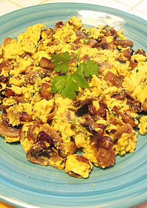Foto principal de Huevos revueltos con champiñones - novatos