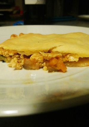 Una foto de Empanada de pollo con verduras y setas