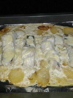 Una foto de Bacalao gratinado