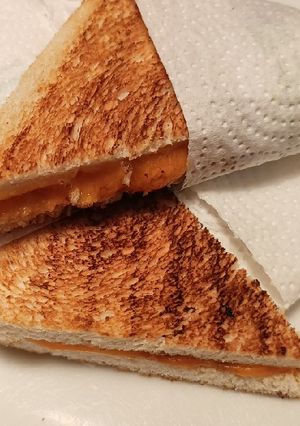 A picture of Cheddar and brown sauce toastie.