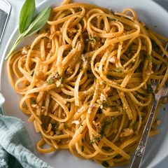 A picture of Linguini In A Garlic Sage Butter Sauce With Walnuts.