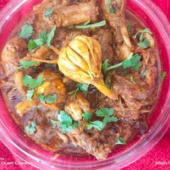 A picture of Deshi chicken curry.