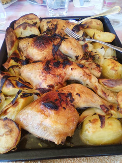 Una foto de Muslos de pollo al horno
