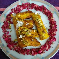 A picture of Indian shahi malpua wrap with khoya / mawa.