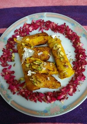 A picture of Indian shahi malpua wrap with khoya / mawa.