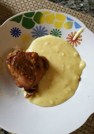 Una foto de Polenta cremosa con pollo al horno