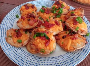 Una foto de Rueditas de papas con queso y tocineta