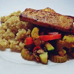 Tofu steak with fried vegetables and quinoa A picture of Tofu steak with fried vegetables and quinoa.