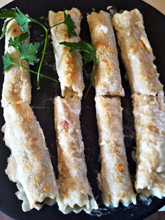 Una foto de Canelones de carne de cocido