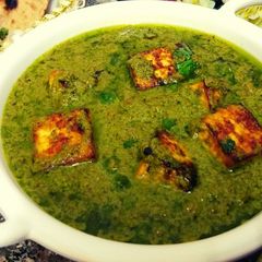 A picture of Nawabi paneer with coriander coconut gravy.