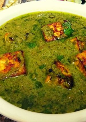 A picture of Nawabi paneer with coriander coconut gravy.