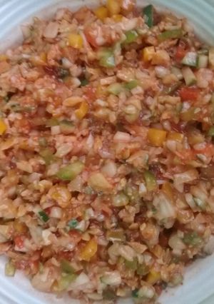 A picture of Just added salad with chilli sauce.