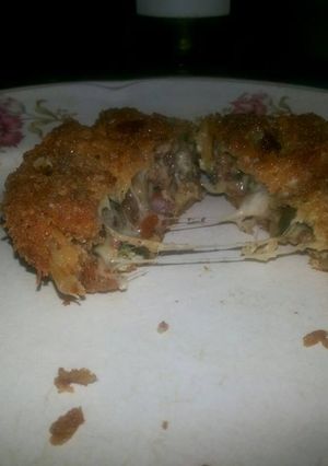 Una foto de Aros de Cebolla Rellenos