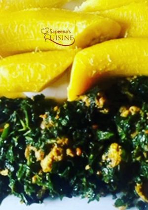 A picture of Boiled plantain with stir fry chicken vegetable sauce.