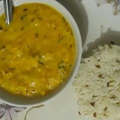 A picture of Kadhi With jeera Rice.