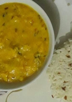 A picture of Kadhi With jeera Rice.