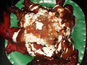 Una foto de asado con salsa barbacoa