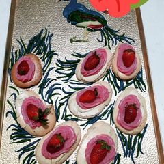 A picture of Pavlova with strawberry custard.