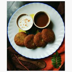 A picture of Aloo tikki stuffed with cottage cheese.