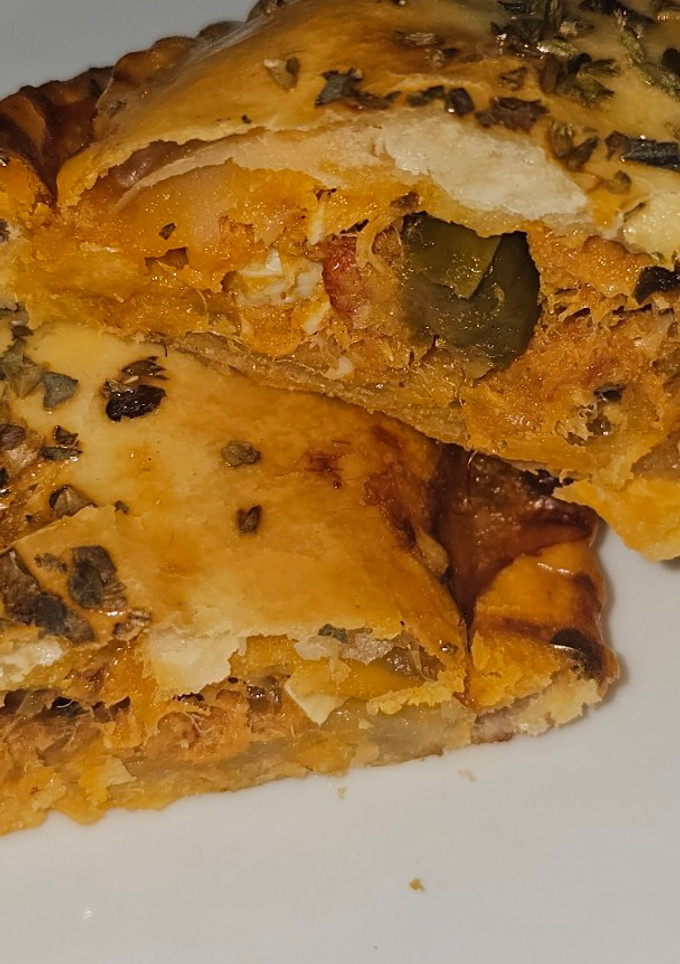 Una foto de Empanadilla de merluza con atún