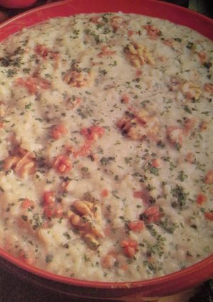 Foto di Risotto con crudo, spumante e noci