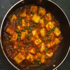 A picture of Matar paneer.