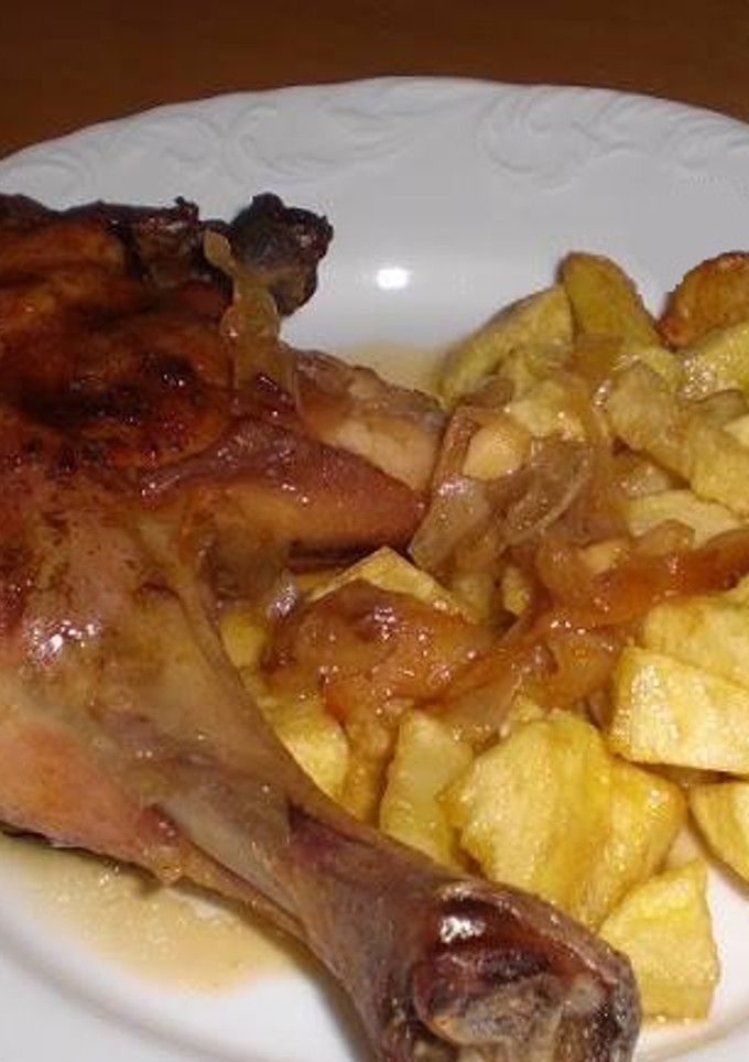 Una foto de Pollo asado con vino blanco