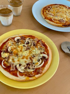 A picture of Pizza with lots of mushrooms!.