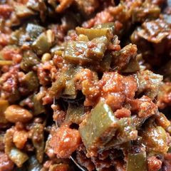 A picture of Flat beans and lentil dumpling curry.