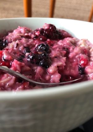 A picture of Oatmeal with almond milk.