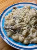 Ñoquis de ricota con bechamel de hongos