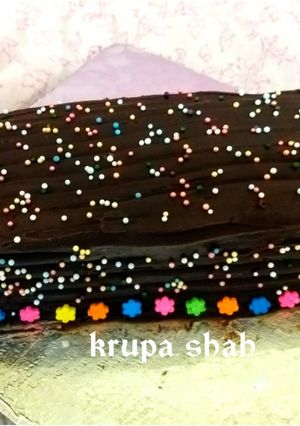 A picture of Leftover roti and milk chocolate's chocolate log cake.