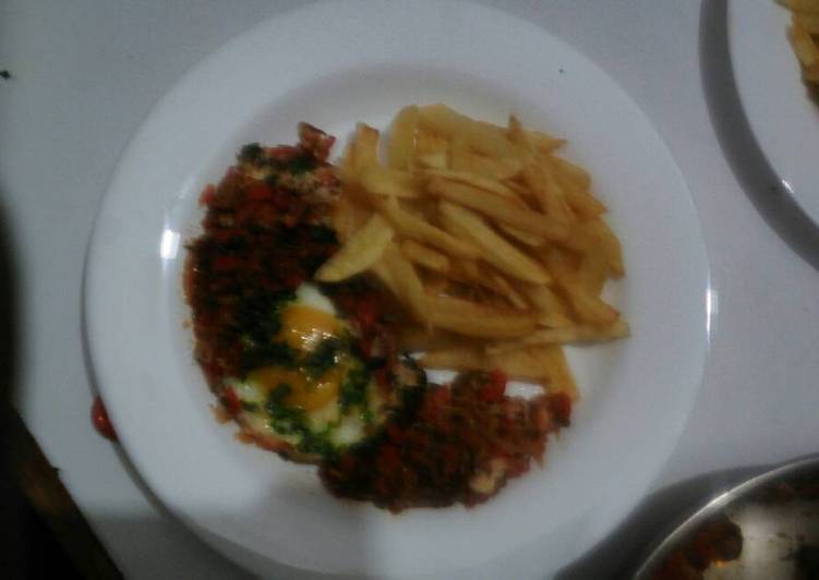 The Simple and Healthy Shakshuka accompanied by French fries