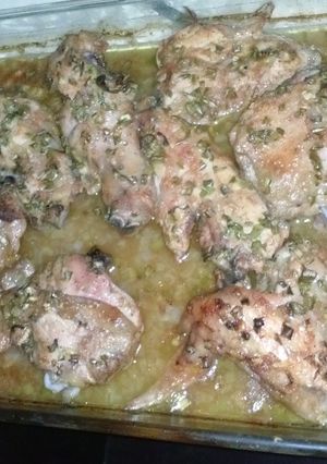 Una foto de Pollo al horno con jugo de naranja