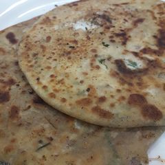 A picture of Paneer onion parantha.