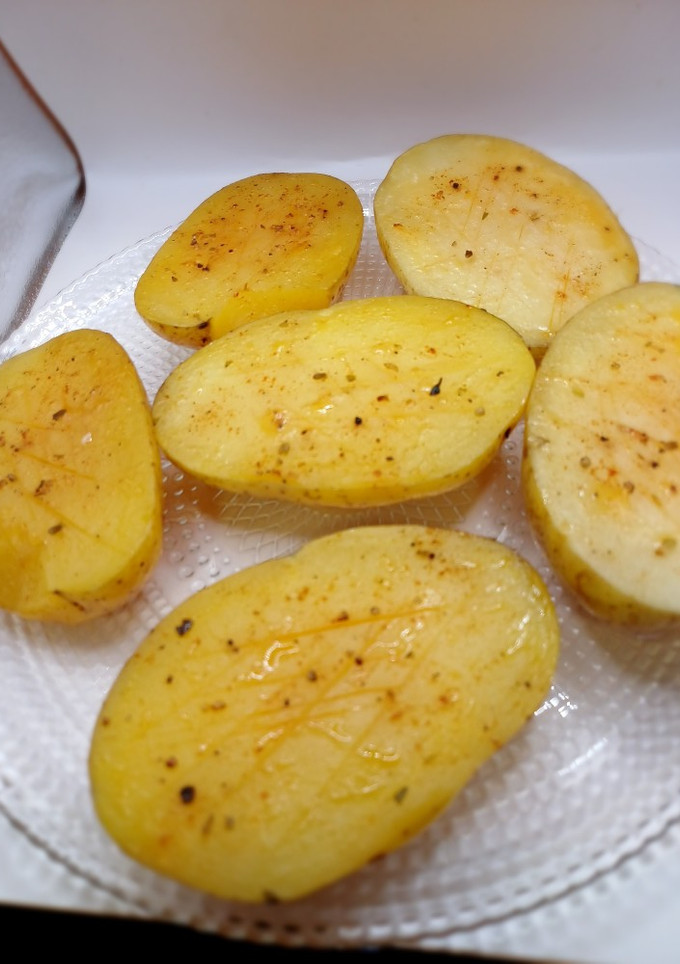 Una foto de Patatas al caliu al horno