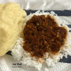 A picture of Kerala Style Inji Puli (Puli Inji) | Traditional Onam Sadya Ginger Curry.