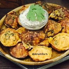 A picture of Eggs Masala Paniyaram/Paddu: Muttai Paniyaram.
