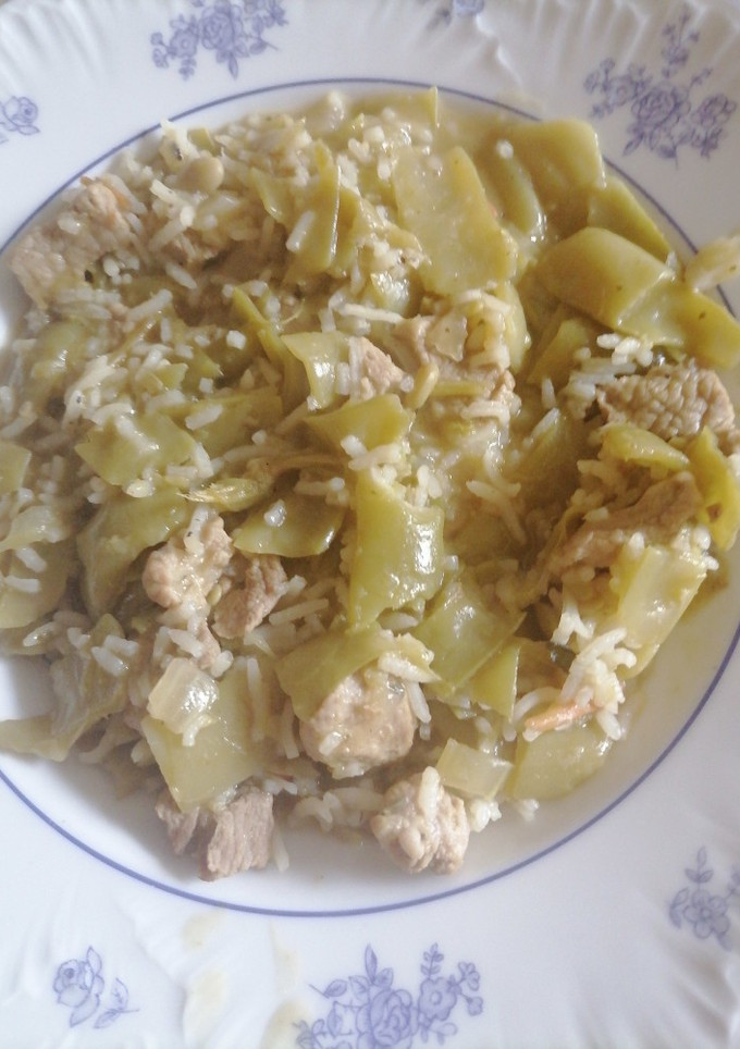 Una foto de Carne con judías y arroz basmati