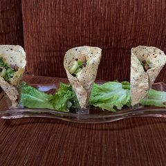 A picture of Papad with salad.