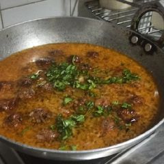 A picture of Vegetable Manchurian with Red Gravy.