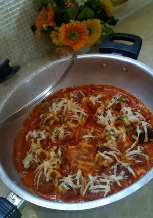صورة لوصفة كوريات 🍆وارز بصلصة🍅