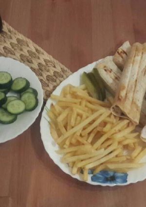 A picture of Chicken Shawarma with Tortilla.