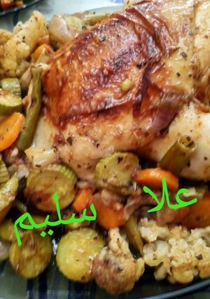 صورة لوصفة دجاج بالخضر في الكيس الحراري