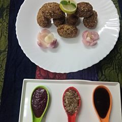 A picture of Oats & poha spinach rolls.